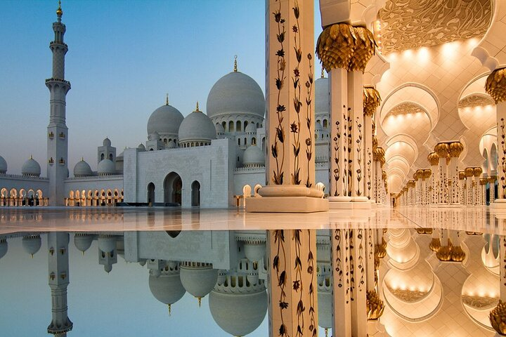 Explore the stunning architecture of Sheikh Zayed Grand Mosque combined with the high-speed excitement of Go Karting at Yas Circuit creating a unique travel experience in Abu Dhabi.